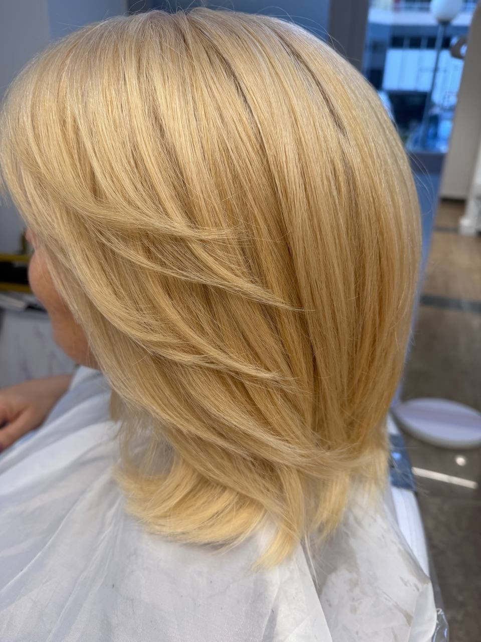Real golden blonde haircut and coloring from Lotus Studio